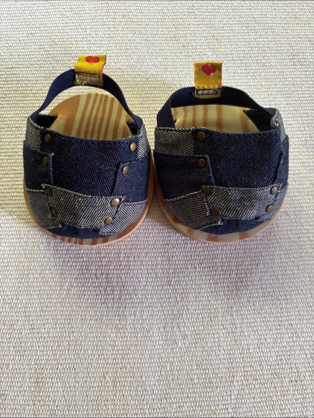 Build-A-Bear Workshop denim patchwork sandals featuring studs & faux wood soles.